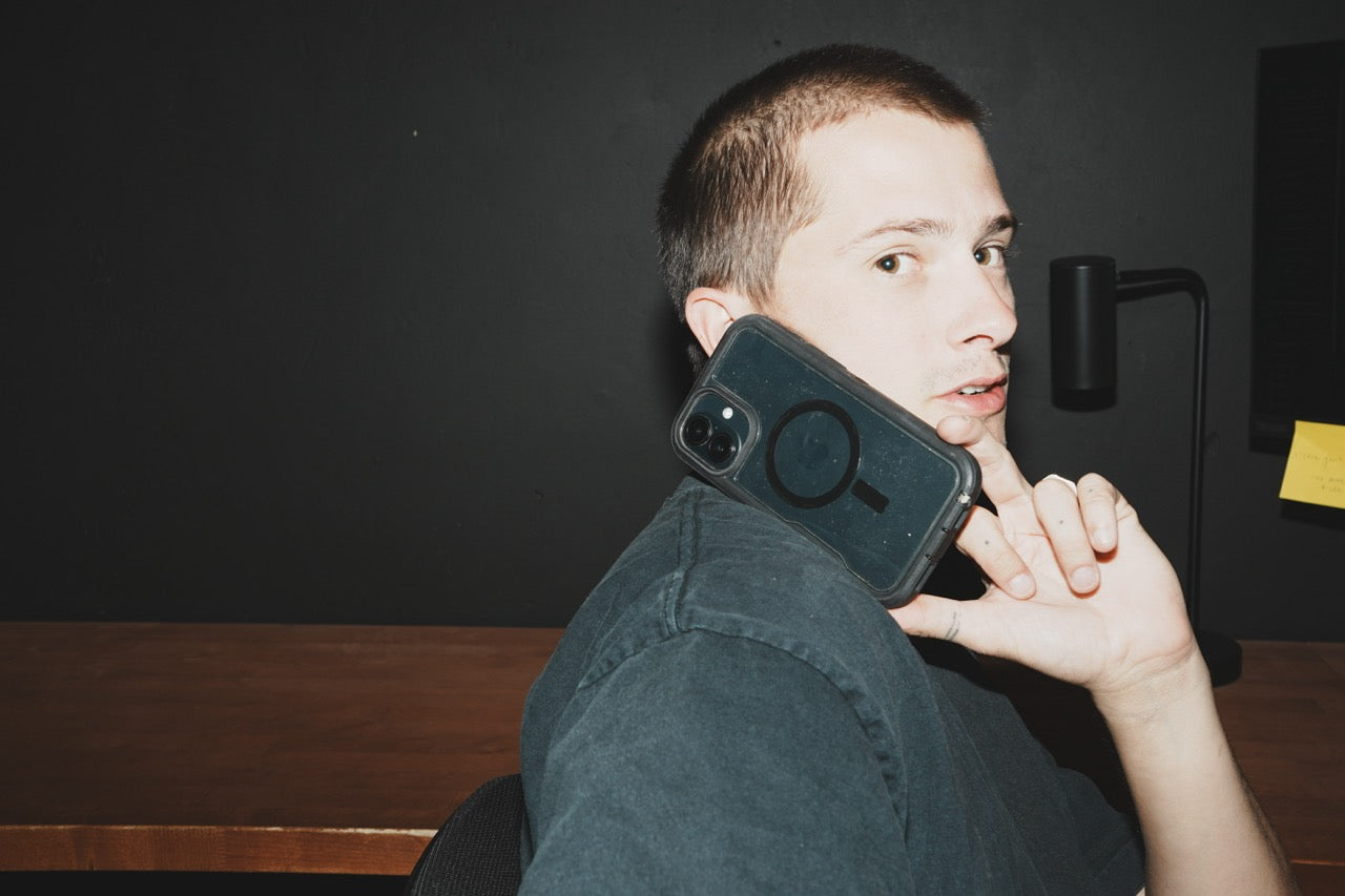 Fairwell Collective team member on a phone call at the office desk