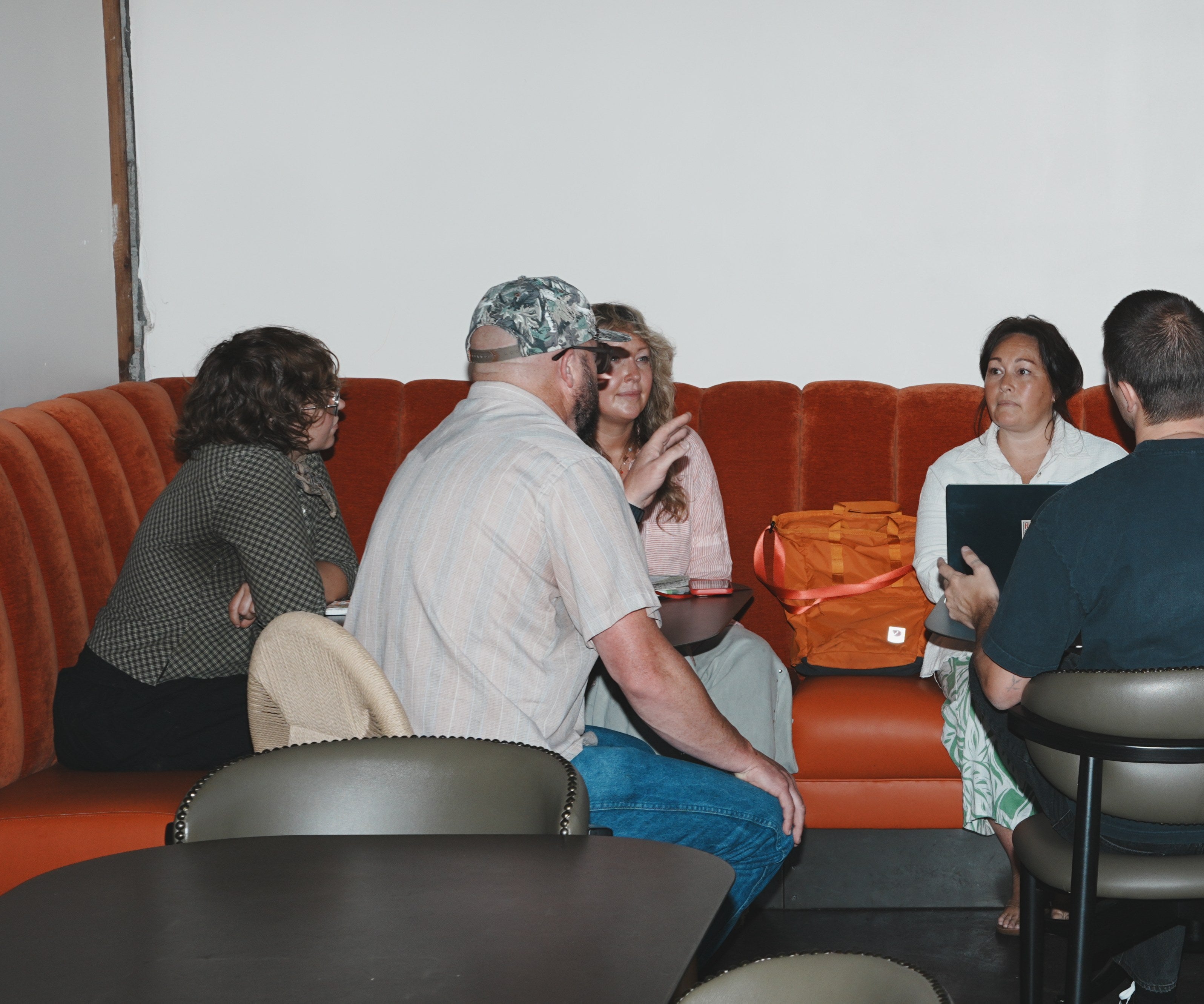 Fairwell Collective team meeting with clients in an Auburn, California cafe booth